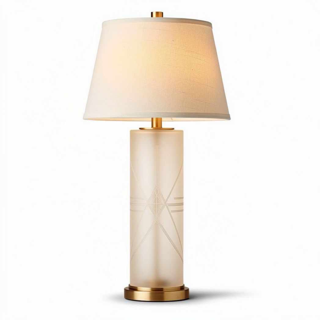 Frosted glass table lamp with decorative gold finish base and fabric shade